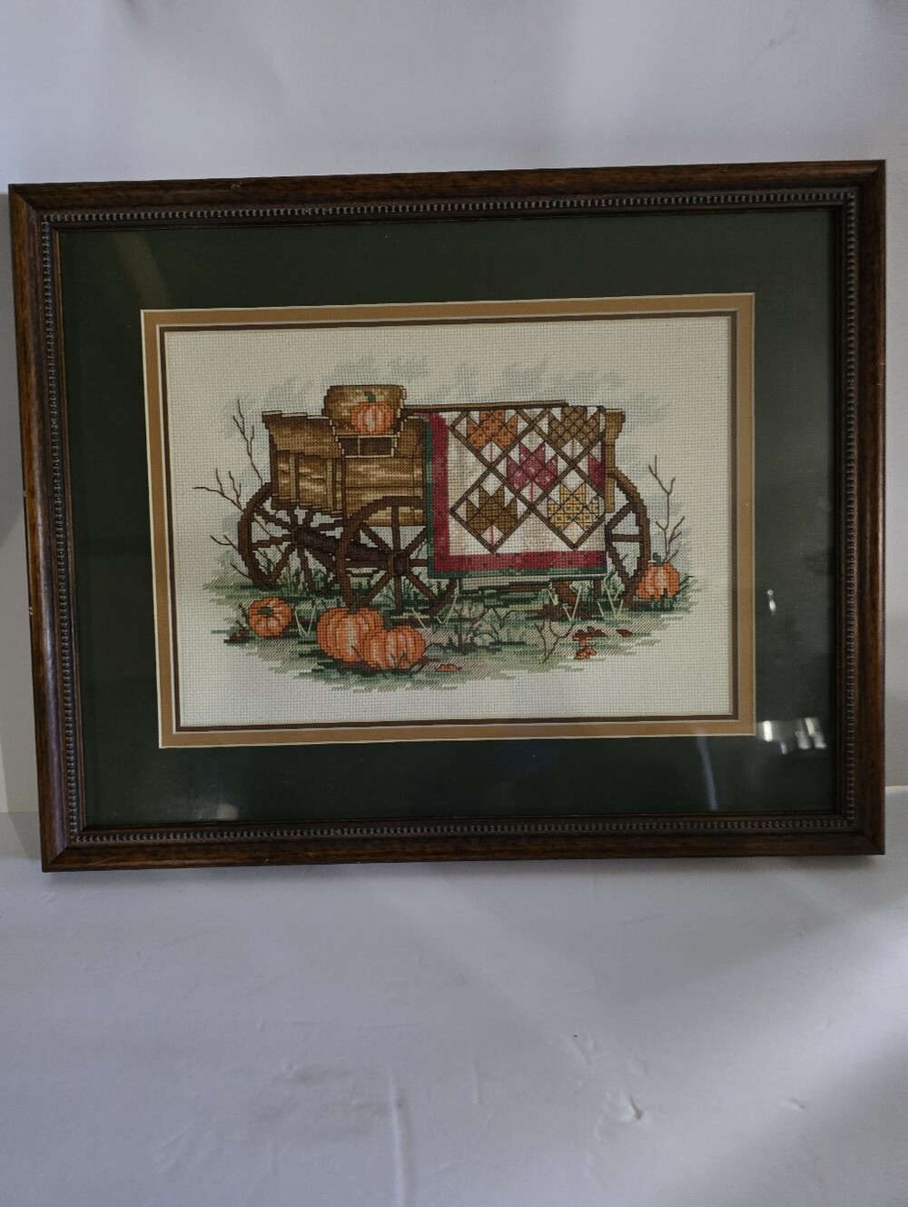 Framed Autumn Wagon Cross-Stitch Wall Art in Green and Brown
